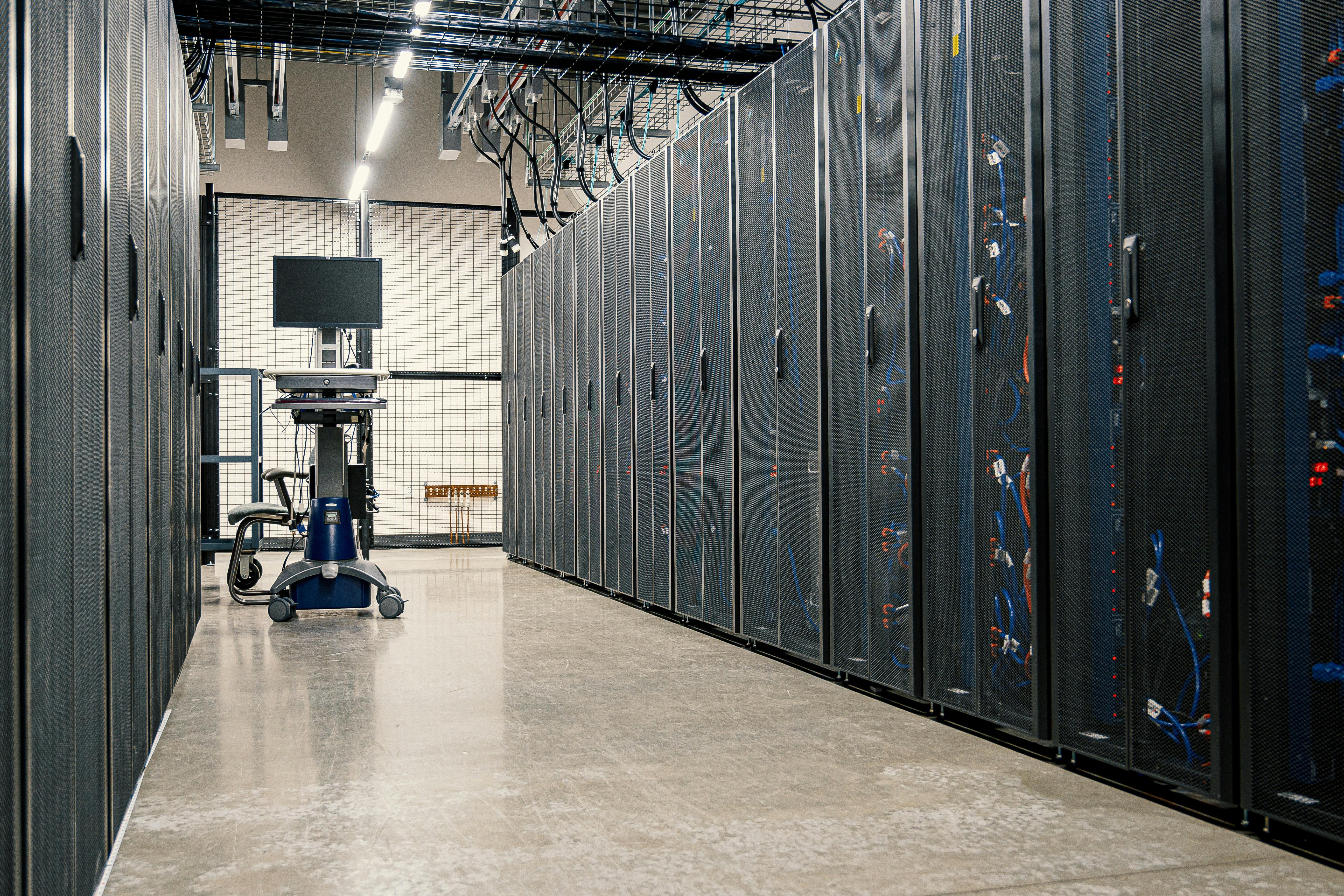 Server racks in a modern data center corridor